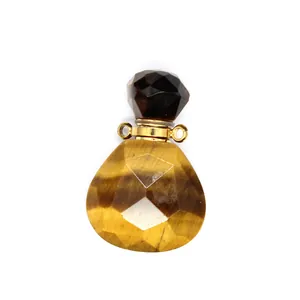 Faceted tiger eye stone essential oil diffuser pendant with gold hardware detailing