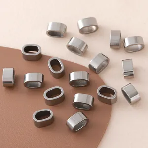 Perles d'espacement ovales en acier inoxydable poli pour bracelets en cuir DIY