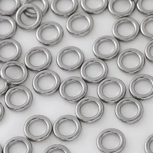 High-quality macro view of polished stainless steel jump rings for DIY jewelry making