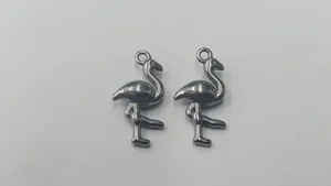 Close-up of high-quality stainless steel flamingo charms for DIY jewelry making