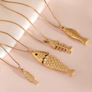 Elegante set di collane in acciaio inossidabile dorato con ciondoli a forma di pesce