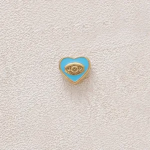 Heart evil eye charm in gold-plated stainless steel with blue enamel for DIY jewelry