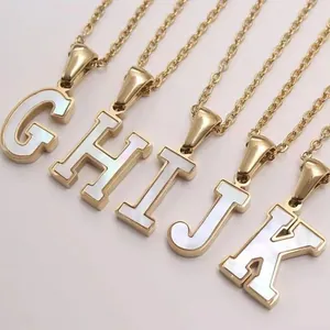 Elegant gold-toned necklaces featuring white mother-of-pearl alphabet pendants G to K