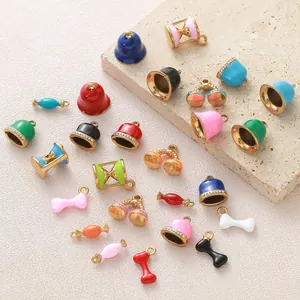 Diverse colorful enamel gold-plated stainless steel charms for DIY jewelry making.