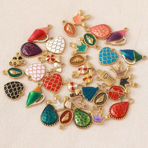 Diverse colorful enamel charms including conch, heart, and crown shapes for DIY jewelry.