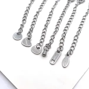 Close-up of stainless steel extension chains featuring diverse tail plate design shapes