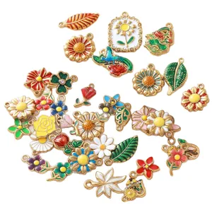 Stainless steel colorful enamel flower charms including daisies for DIY jewelry making.