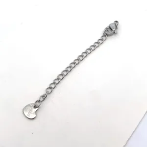 Close-up of 7cm stainless steel extender chain with lobster clasp and heart tag