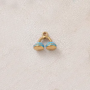 Close-up of a gold-plated stainless steel phone pendant with light blue enamel detail.