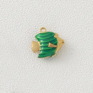 Detail showing green enamel gold-plated fish pendant charm for DIY jewelry making