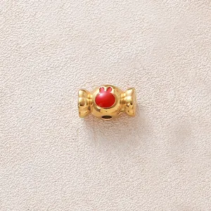 Perle d'espacement exquise en forme de bonbon plaqué or avec un motif de lapin en émail
