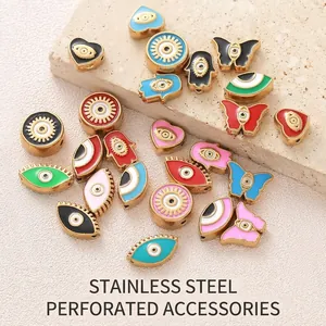 Stainless steel gold-plated beads with evil eye heart butterfly designs for DIY jewelry