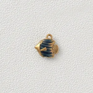 Close-up of gold-plated stainless steel angelfish pendant with blue enamel
