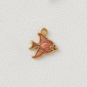 Detail view of a gold-plated stainless steel tropical fish pendant with orange enamel