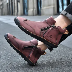 Detailed view of men's casual outdoor short boots featuring side zipper and stitching