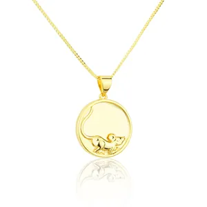 Detailed view of an 18K gold stainless steel mouse zodiac pendant with box chain
