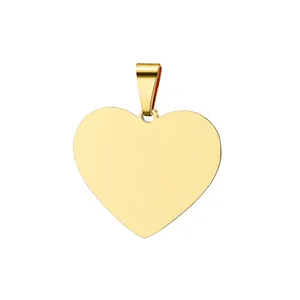Detail shot of a polished gold heart-shaped stainless steel pendant with high gloss.