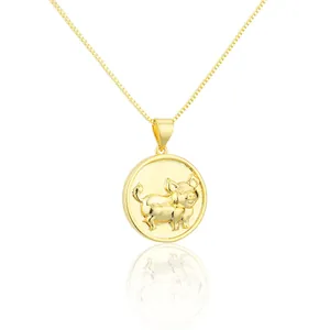 Close-up of gold-plated stainless steel pig zodiac pendant necklace with reflection