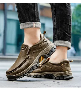 Side view of men's casual brown leather outdoor hiking shoes with a textured sole