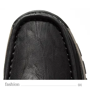 Close-up of black textured leather toe and stitching on men's casual shoe