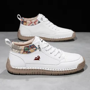 White mid-top outdoor casual boots with colorful woven ankle detail and stitched gum sole.