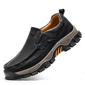 Durable black leather men's casual outdoor walking shoe featuring a thick rugged rubber sole