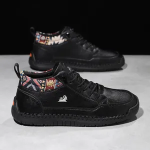 Close-up of black mid-top outdoor casual shoes with ethnic patterned collar