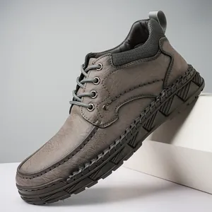 Men's casual grey leather Martin boots featuring durable handmade stitching and thick rubber soles