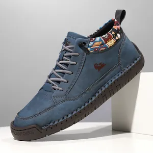 Detailed side view of blue mid-top Martin boots with colorful ethnic woven pattern collar.