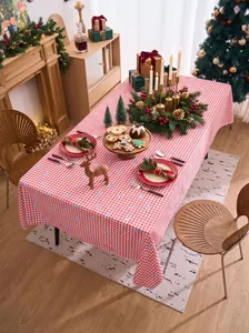 Detail view of red and white checkered tablecloth for Christmas table decoration