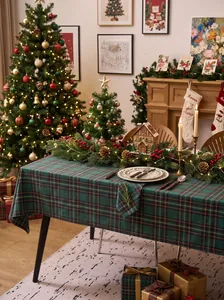 Classic green and red plaid tablecloth in a festive Christmas dining room setting
