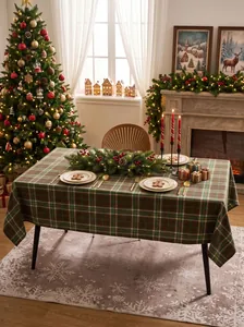 Classic green and brown plaid tablecloth set in a festive Christmas dining room