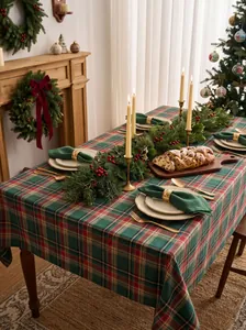 Festive red and green plaid tablecloth for Christmas dinner table decoration