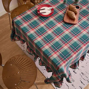 Christmas green and red plaid tablecloth with elegant ruffled edges for rustic dining decor