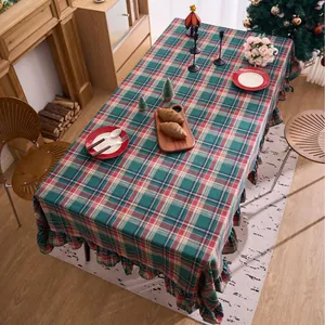 Festive Christmas green and red plaid ruffled tablecloth for American farmhouse dining decor