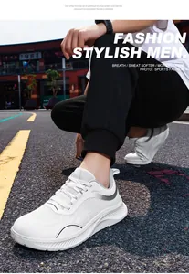 Detailed outdoor shot of men's lightweight white mesh athletic walking shoes on road.
