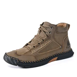 Men's stylish brown PU leather ankle boots with detailed hand-stitching and lace-up design.