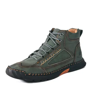 Side view of premium men's green PU leather ankle boots with handmade stitching details