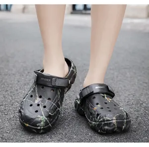 Close-up detail of men's breathable camouflage outdoor clogs with thick cushioned soles