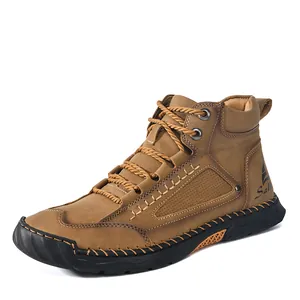 Detailed side view of men's hand-stitched brown PU leather ankle boots with lace-up design