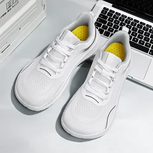 Breathable white mesh sports shoes for men featuring a comfortable wide toe box design