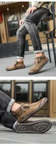 Detaillierte Nahaufnahme der handgenähten Nähte und des Reißverschlusses an braunen Lederboots