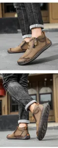 Detailansicht der braunen Martin-Stiefel aus Leder mit seitlichem Reißverschluss.