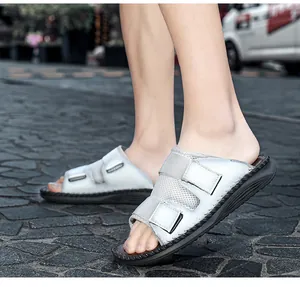 Breathable men's white casual sandals featuring adjustable magic tape straps and rubber sole
