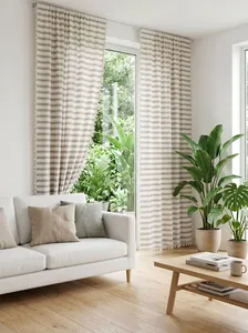 Detailed view of striped tassel curtains complementing a modern living room interior.
