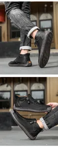 Detailansicht der handgefertigten Nähte und des Reißverschlusses an schwarzen Ankle Boots