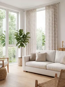 Light French style striped curtains with tassels shown in a bright living room lifestyle scene