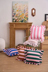 Set of striped Dutch velvet pillow covers with elegant ruffled edges for sofa decor.