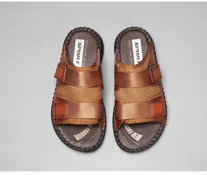 Top view of brown men's casual summer sandals featuring double velcro straps and mesh