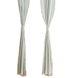 Elegant light French style green striped sheer curtains with decorative tassel trim